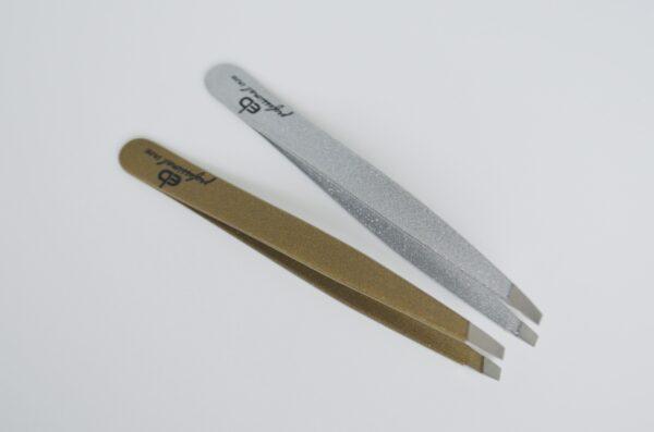 Pinzette inox punta obliqua linea oro e argento